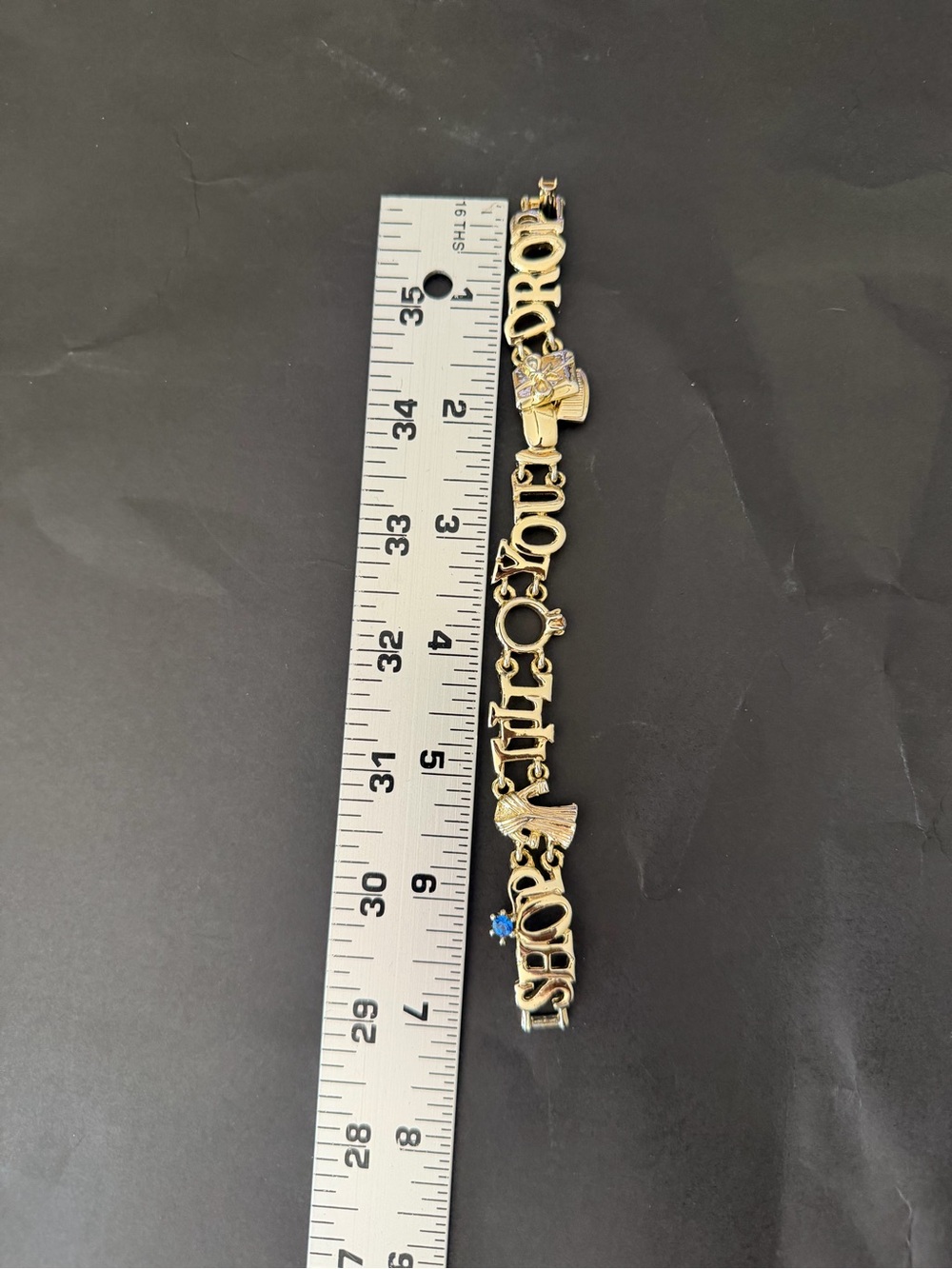 Gold Tone 'Shop Til You Drop' Charm Bracelet - Picture 1 of 5